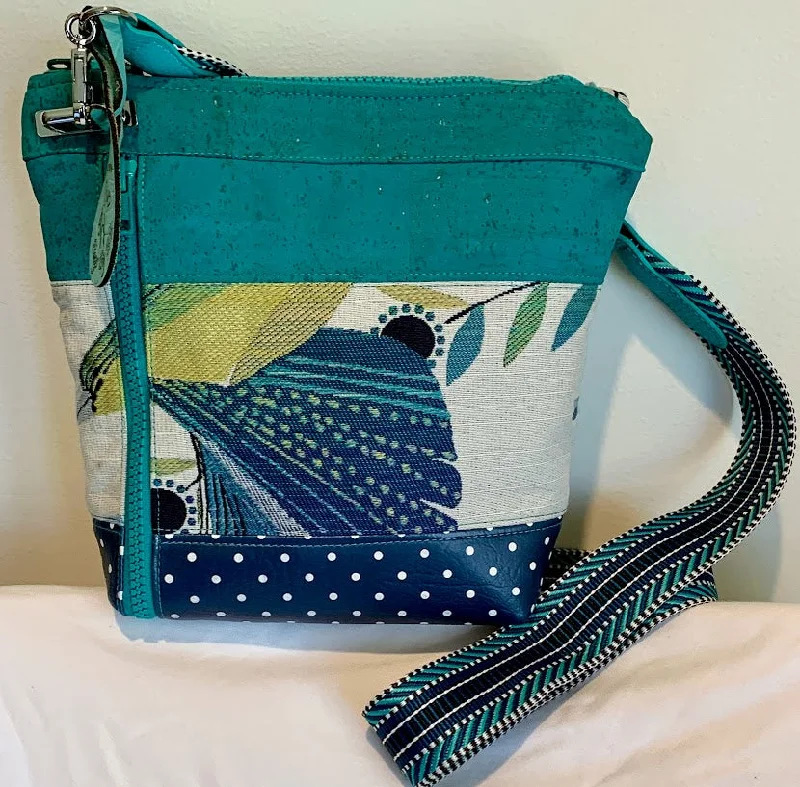 Designer Bags For Luxury Collectors Bright, colorful, unique small crossbody in shades of teal, turquoise and blue. Designer Bags For Luxury Collectors Bright, colorful, unique small crossbody in shades of teal, turquoise and blue.