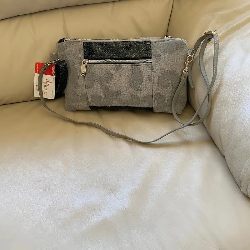 Bags For Sporty And Athletic Styles Gray and black mini crossbody with exterior zipper pocket. New Item Bags For Sporty And Athletic Styles Gray and black mini crossbody with exterior zipper pocket. New Item