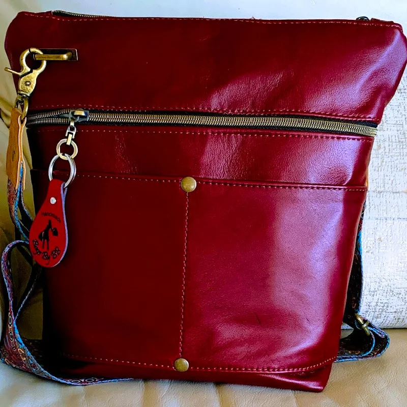 Lightweight Bags For Senior Travelers Beautiful reddish/merlot leather midsize crossbody with pockets galore Lightweight Bags For Senior Travelers Beautiful reddish/merlot leather midsize crossbody with pockets galore