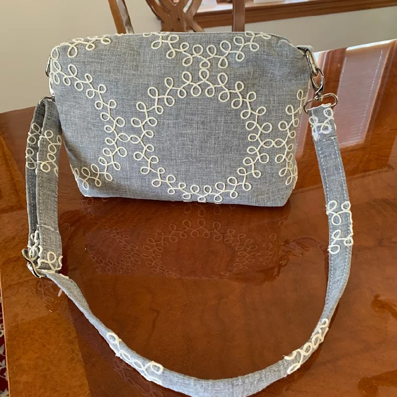 Inspired Bags For Luxury Fashion Lovers New Item! Distinctive gray and white fabric crossbody with quality nickel hardware. Inspired Bags For Luxury Fashion Lovers New Item! Distinctive gray and white fabric crossbody with quality nickel hardware.