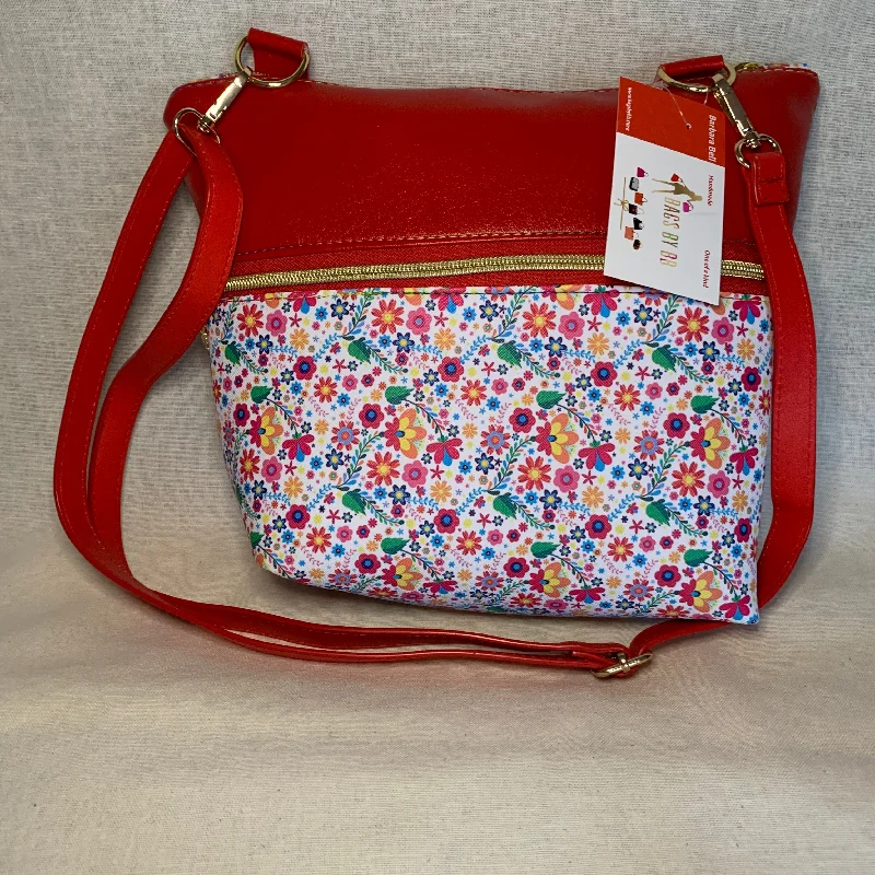 Cozy Chic Promotions Colorful vinyl crossbody with two large exterior zipper pockets. Cozy Chic Promotions Colorful vinyl crossbody with two large exterior zipper pockets.