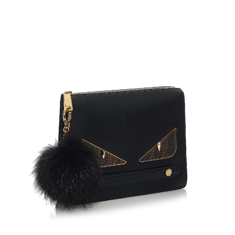 Minimalist Bags For Clean And Modern Aesthetics Fendi Monster Leather Clutch Bag (SHG-33968) Minimalist Bags For Clean And Modern Aesthetics Fendi Monster Leather Clutch Bag (SHG-33968)